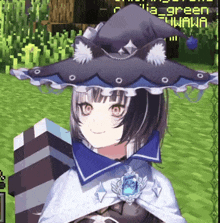 a girl in a witch hat is smiling in front of a green watermark
