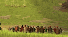 a group of people standing in a field with a bear in the background .