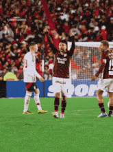 a soccer player wears a jersey that says opalex on it