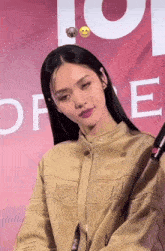 a woman wearing a jacket that says easy fun