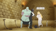 a group of people in a room with a brick wall