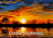 a sunset over a body of water with the words `` good morning ''