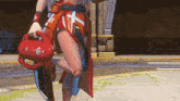 a video game character holding a red bag with the letter o on it