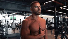 Athlete-mike-thurston Rubbing-chest-muscles GIF - Athlete-mike-thurston Rubbing-chest-muscles Sore-chest GIFs