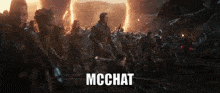 a group of people are standing in a field with the word mcchat written on the bottom