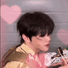a blurry picture of a man eating food with chopsticks
