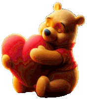 a winnie the pooh bear holding a red heart