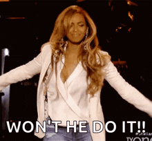 a woman with her arms outstretched says won 't he do it !