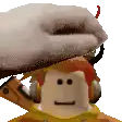 a person wearing headphones and a hat is being touched by a hand .