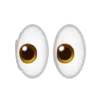 a pair of white cartoon eyes with brown pupils