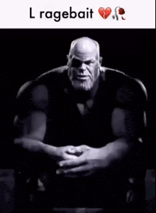 a black and white photo of thanos with the words l ragebait on the bottom .