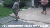 a man is holding a light saber while another man stands behind him with the words you underestimate my power below him