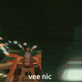 a picture of a girl with the words vee nic on the bottom right
