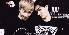 two young men are standing next to each other and one of them says swags nervously .