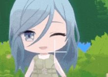 a girl with blue hair is smiling and looking at the camera .