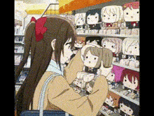 a girl is standing in front of a shelf of stuffed animals in a store .
