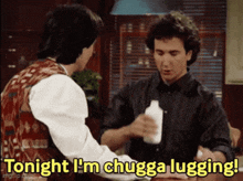 two men are sitting at a table and one of them says tonight i 'm chugga lugging .