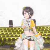 a girl in a yellow and white outfit is standing in front of a microphone