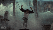 a man in a tuxedo is jumping into a waterfall with the words tom cruise mission impossible on the bottom