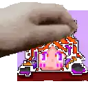a hand is holding a pixel art of a girl 's face