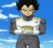 vegeta from dragon ball z is standing with his arms crossed in front of a blue sky .