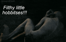 a picture of a statue with the words filthy little hobbitses