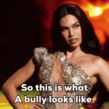 a woman in a very revealing dress says so this is what a bully looks like