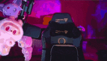 a person is sitting in a chair that says trader raj on the back
