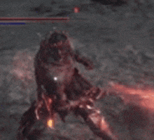 a person is being attacked by a monster in a video game in a cave .
