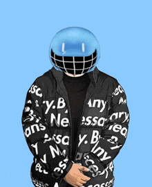 a person wearing a helmet and a jacket that says y.b.