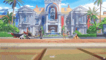 a group of people are standing in front of a large building with a fountain in the middle .