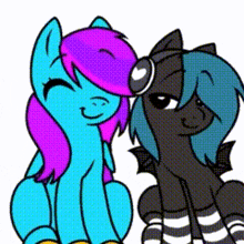 a couple of ponies are sitting next to each other