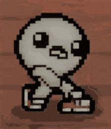 a pixel art of a skeleton standing on a brown surface .