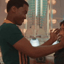 a man and a woman are looking at each other