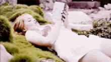 Debby Ryan Reading GIF - Debby Ryan Reading Lying Down GIFs