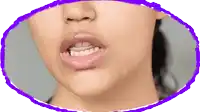 a close up of a woman 's face with a purple border