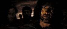 a man with long hair and a beard says " i have filled my heart "