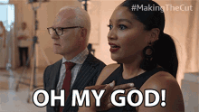 a man and a woman are standing next to each other and the woman is saying oh my god
