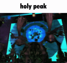 a picture of a stage with the words holy peak on the top