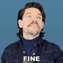 a man with a mustache is wearing a turtleneck and denim shirt and says fine