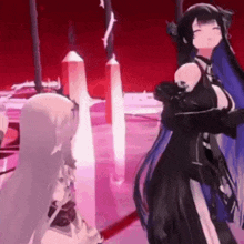 a couple of anime girls are standing next to each other in a room .
