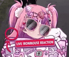 a girl wearing sunglasses and a sign that says `` live ironmouse reaction '' .