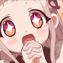 a close up of a girl 's face with a diamond in her eye