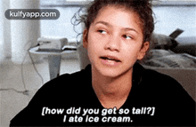 a woman is talking about how she got so tall and ate ice cream .