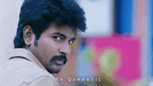 a close up of a man 's face with the words mr romantic on it