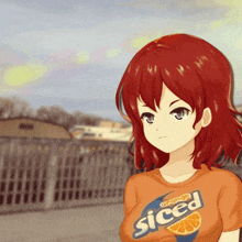 a girl with red hair wears an orange sliced shirt
