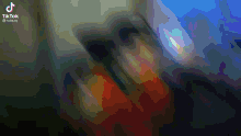 a tiktok video shows a blurry image of a person 's face