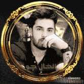 a picture of a man in a gold frame with the words vivavideo written on the bottom