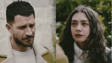 a man with a beard and a woman with curly hair are looking at each other