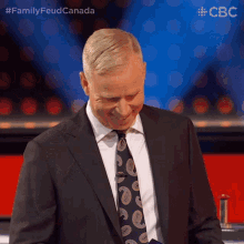 Nervous Smile Gerry Dee GIF - Nervous Smile Gerry Dee Family Feud Canada GIFs